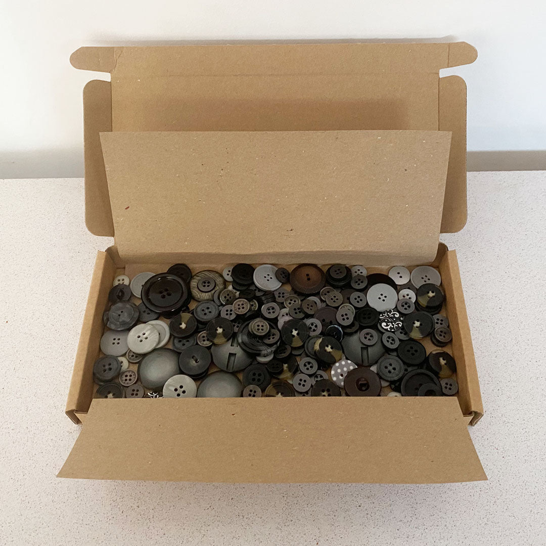 Blacks and Greys vintage and new buttons sorted by colour and sold by weight