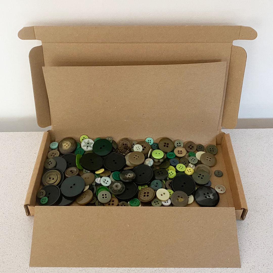 Greens vintage and new buttons sorted by colour and sold by weight