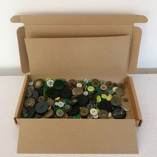 Greens vintage and new buttons sorted by colour and sold by weight