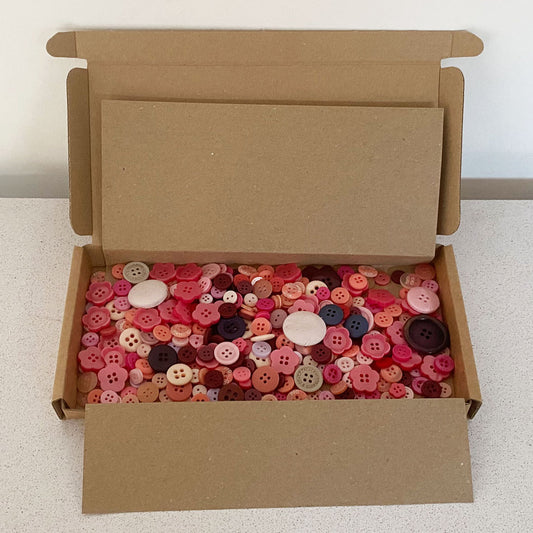 Pinks and Purples vintage and new buttons sorted by colour and sold by weight