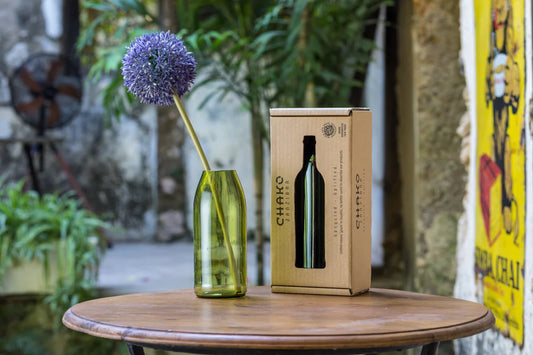 Kilua - dark green carafe upcycled in Zanzibar from waste glass bottles