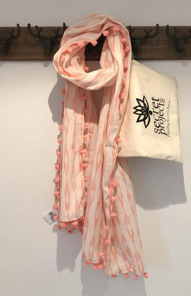 Secret Scarf, Ikkat cream & peach pom-poms